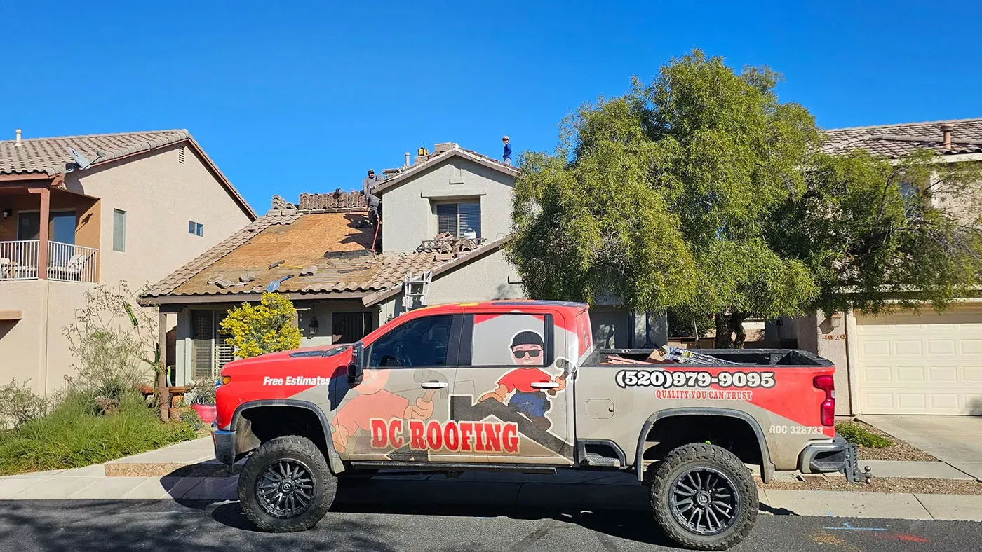 DC Roofing of Arizona at work reroofing a tile roof in Tucson