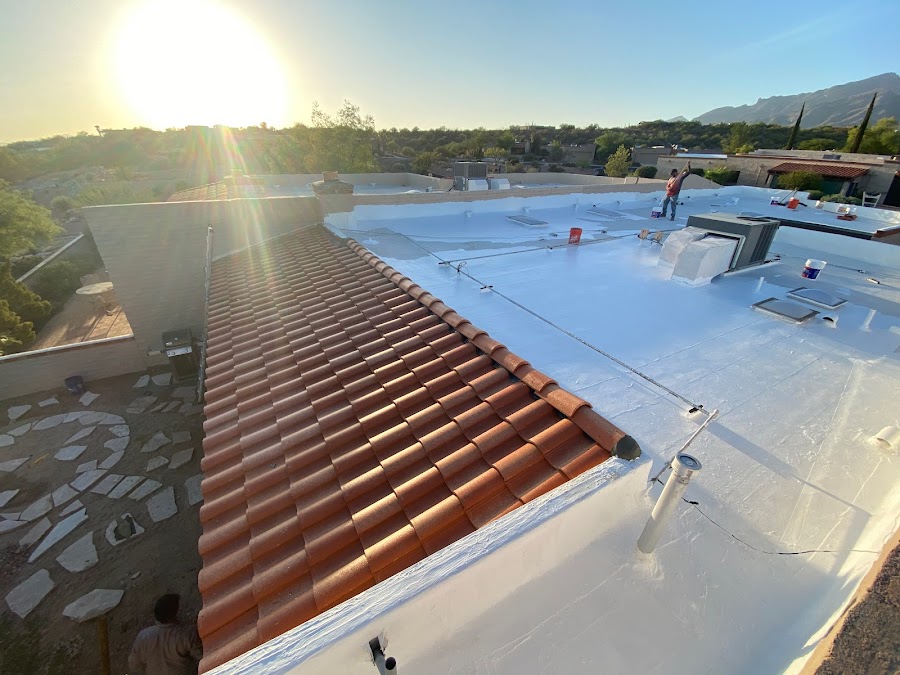 importance-of-roof-maintenance-w900 maintenance being performed on a flat roof in Tucson